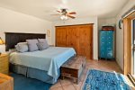The bedroom is spacious with a king size hybrid bed with memory foam and inner spring